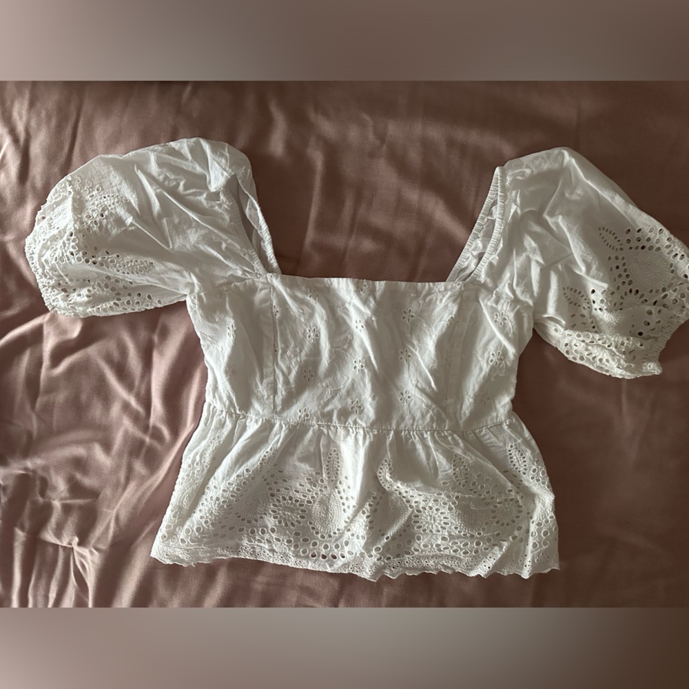 White eyelet and peplum top